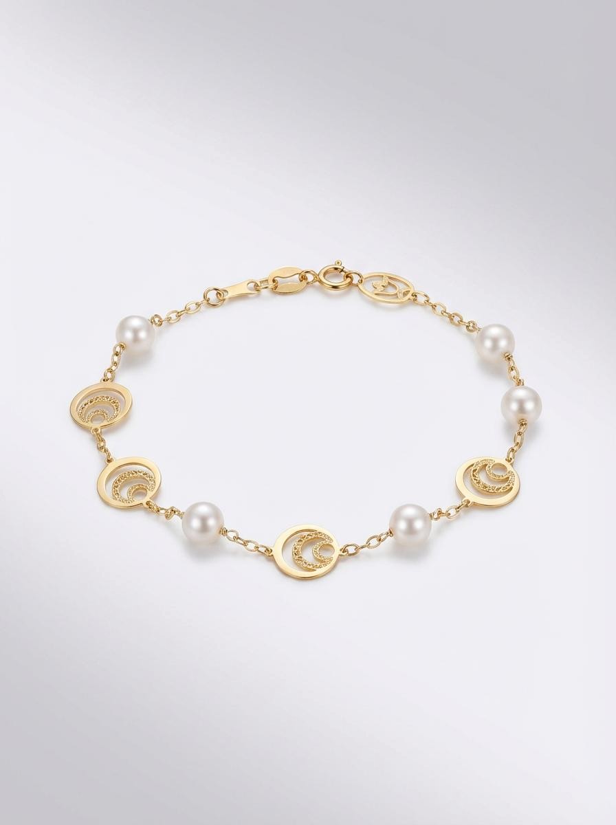 1 PU 2.5GR ORO 18K CON PERLAS Y REDONDOS